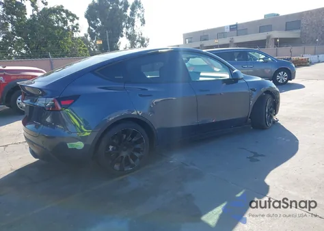 2023 Tesla Model Y Awd/Long Range Dual Motor All-Wheel Drive из США, поврежденный, VIN 7SAYGDEE3PF831212